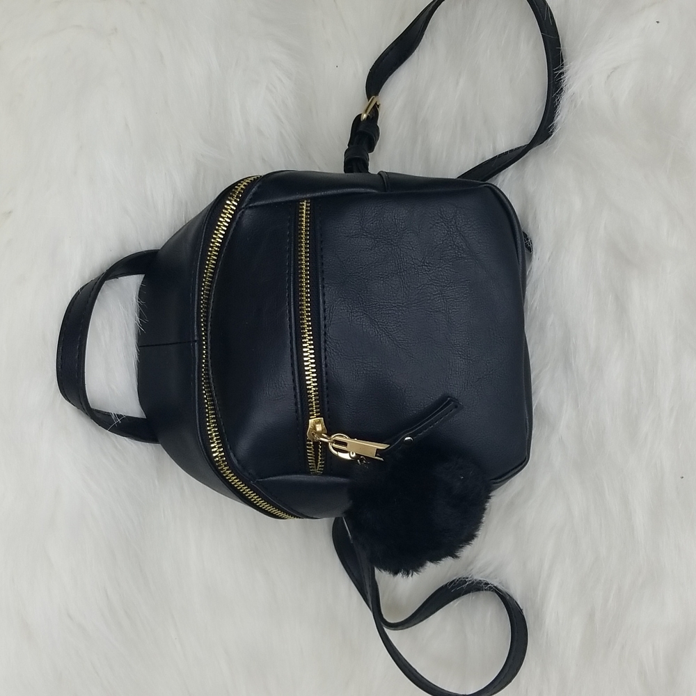 MINI CROSSBODY BACKPACK